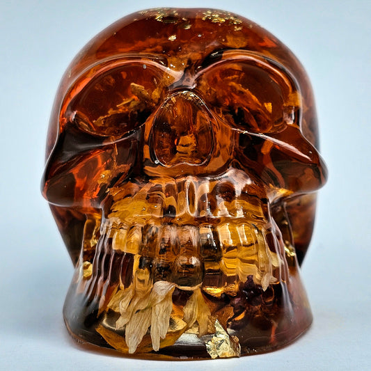 #0281 Handmade Resin Skull - Sunflowers and Marigolds in a warm orange resin.