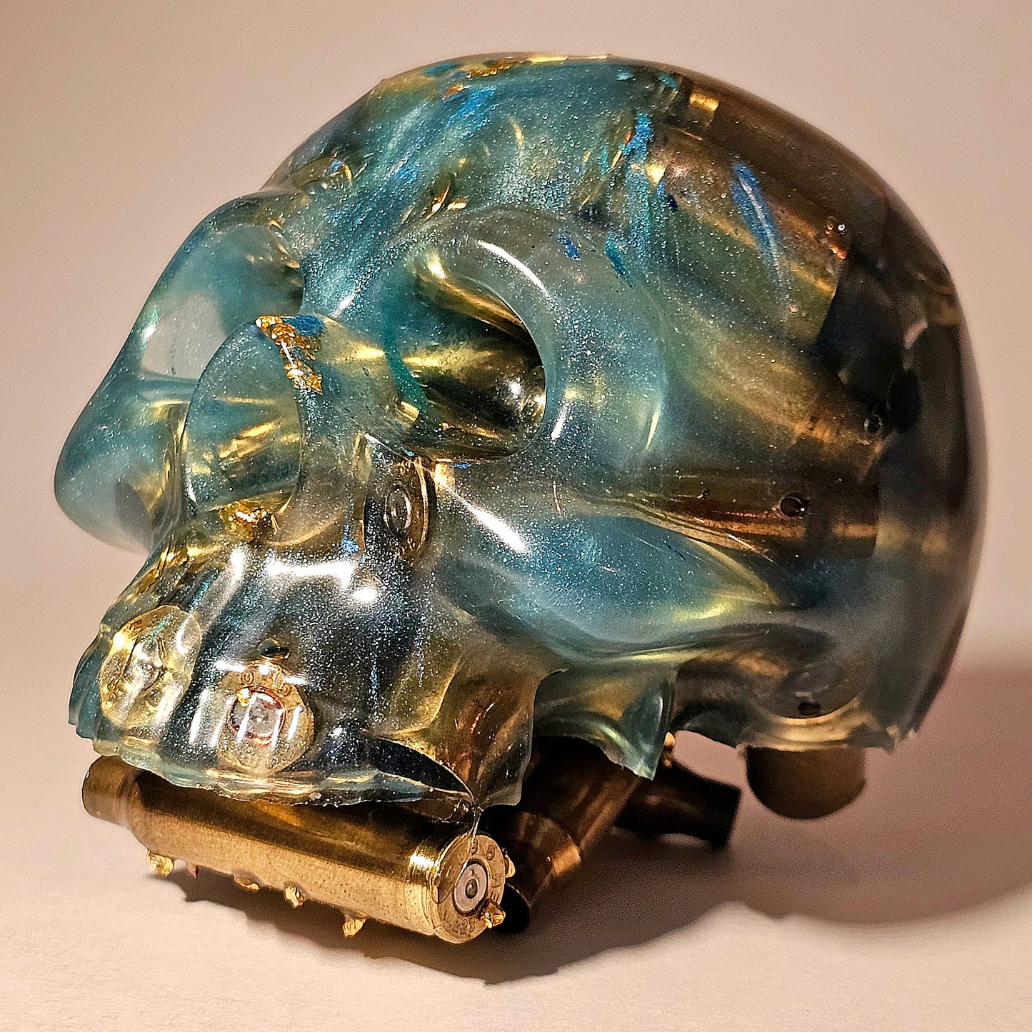 #0259 Handmade Resin Skull - Mixed brass in silver pigmen/blue resin. One of a kind for sure.