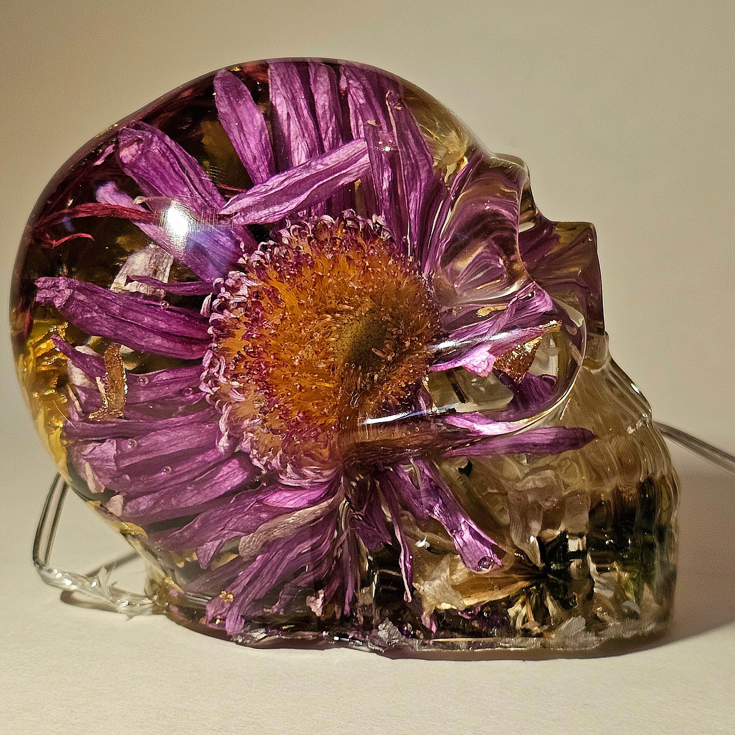 #0272 Handmade Resin Skull - Mixed flowers in clear resin. HAS LIGHTS. Battery operated.