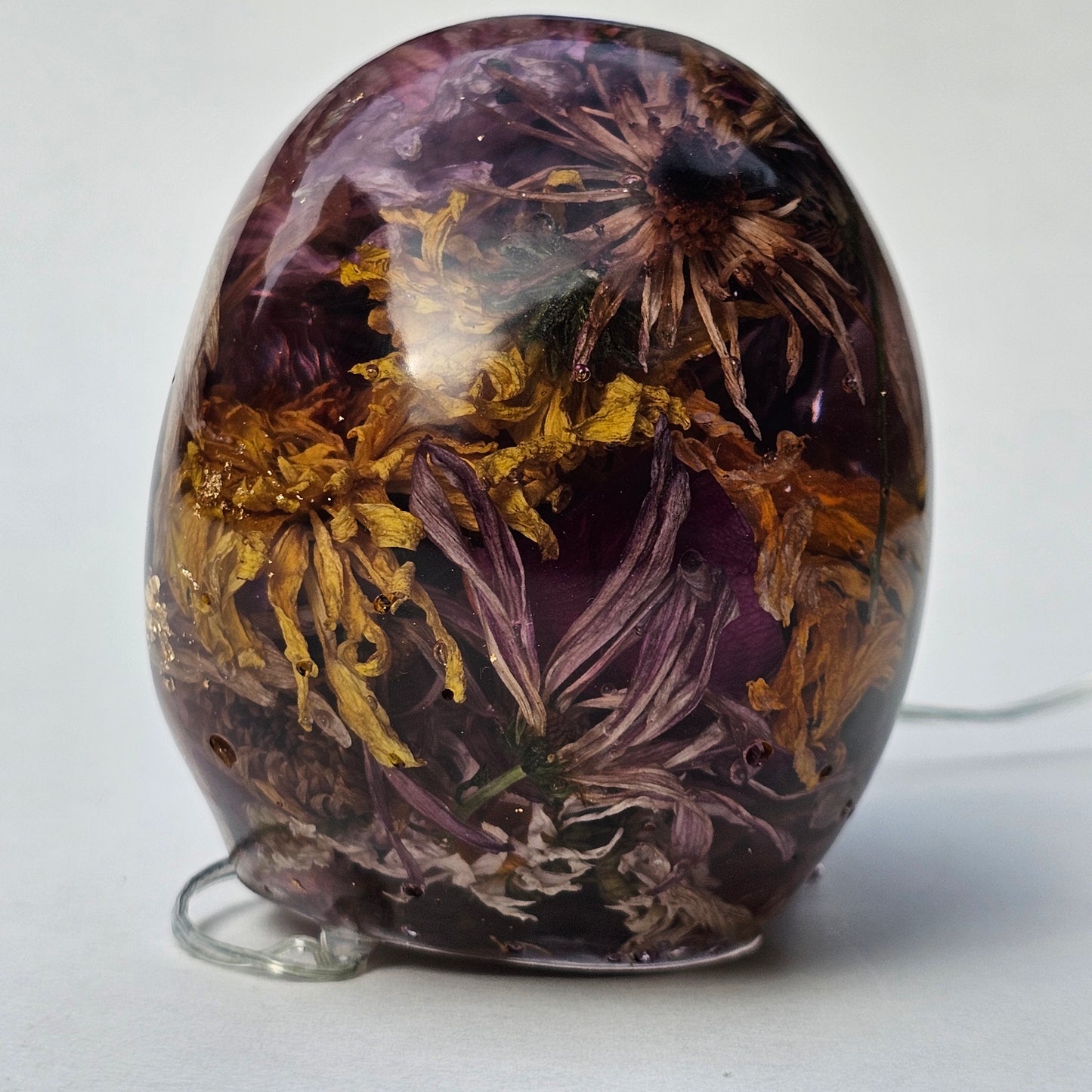 #0294 - Handmade Resin Skull - Autumn flower blend in light purple resin. This one lights up! HAS LIGHTS!
