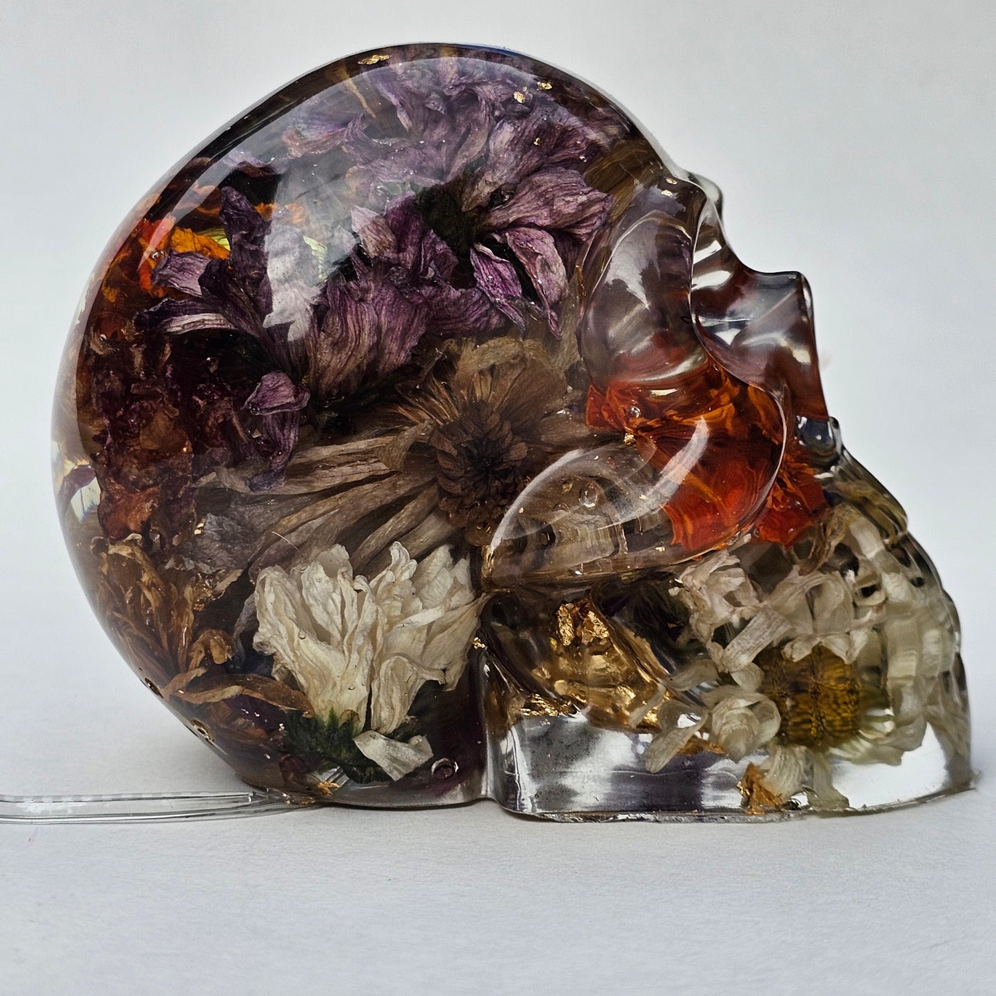 #0297 - Handmade Resin Skull - Autumn flower blend with gold foil. This one lights up! HAS LIGHTS!