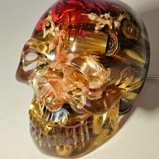 #0263 Handmade Resin Skull - Mixed flowers with brass in clear resin, very nice piece. HAS LIGHTS. Battery operated.