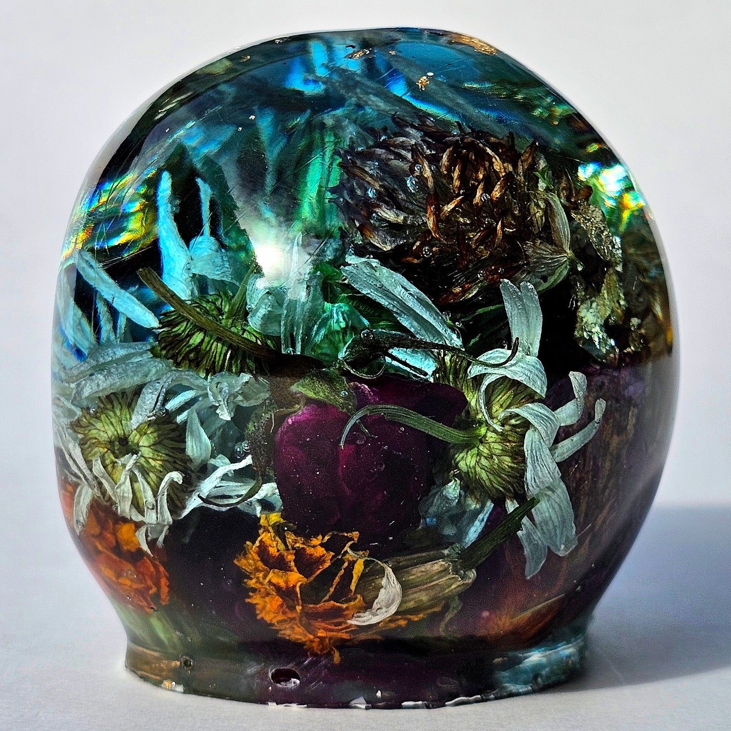 #0289 - Handmade Resin Skull - This one's a bit out there!  Fun piece as well, in blue resin accompanied by mixed flowers.