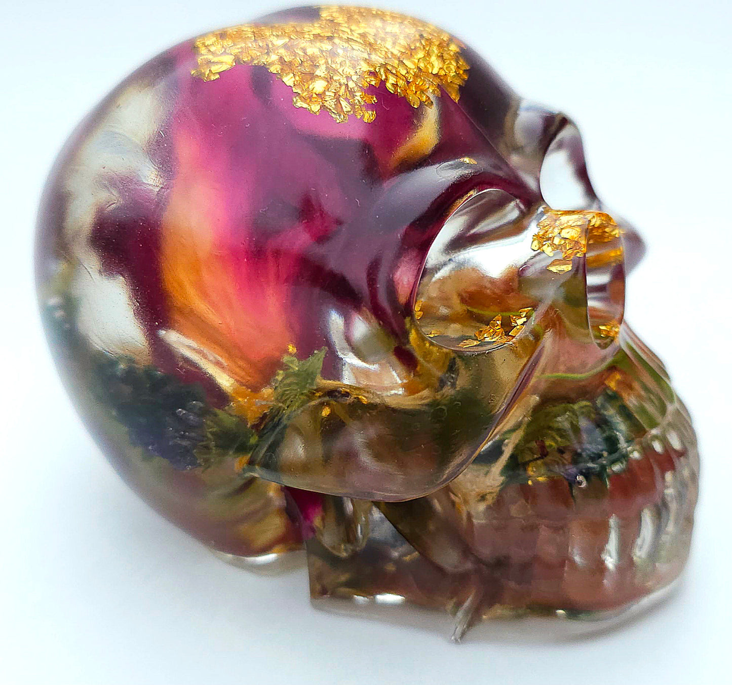 *SOLD*Handmade Resin Skull- Large wild Rose, with flower mixture. Discounted price. This piece came out quite cloudy.