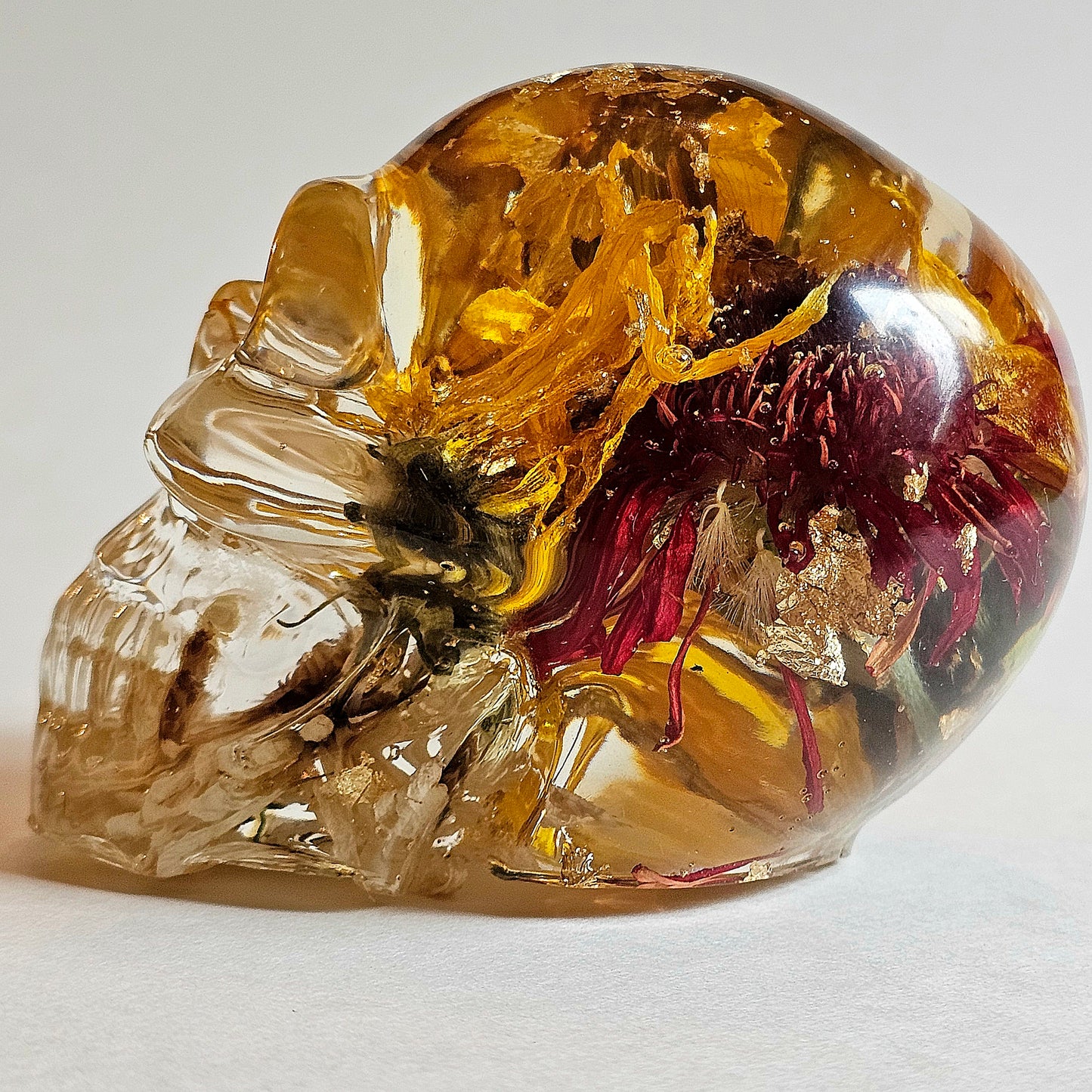 #0000 - Handmade Resin Skull - Mixed flowers in clear resin. Nice detail here.