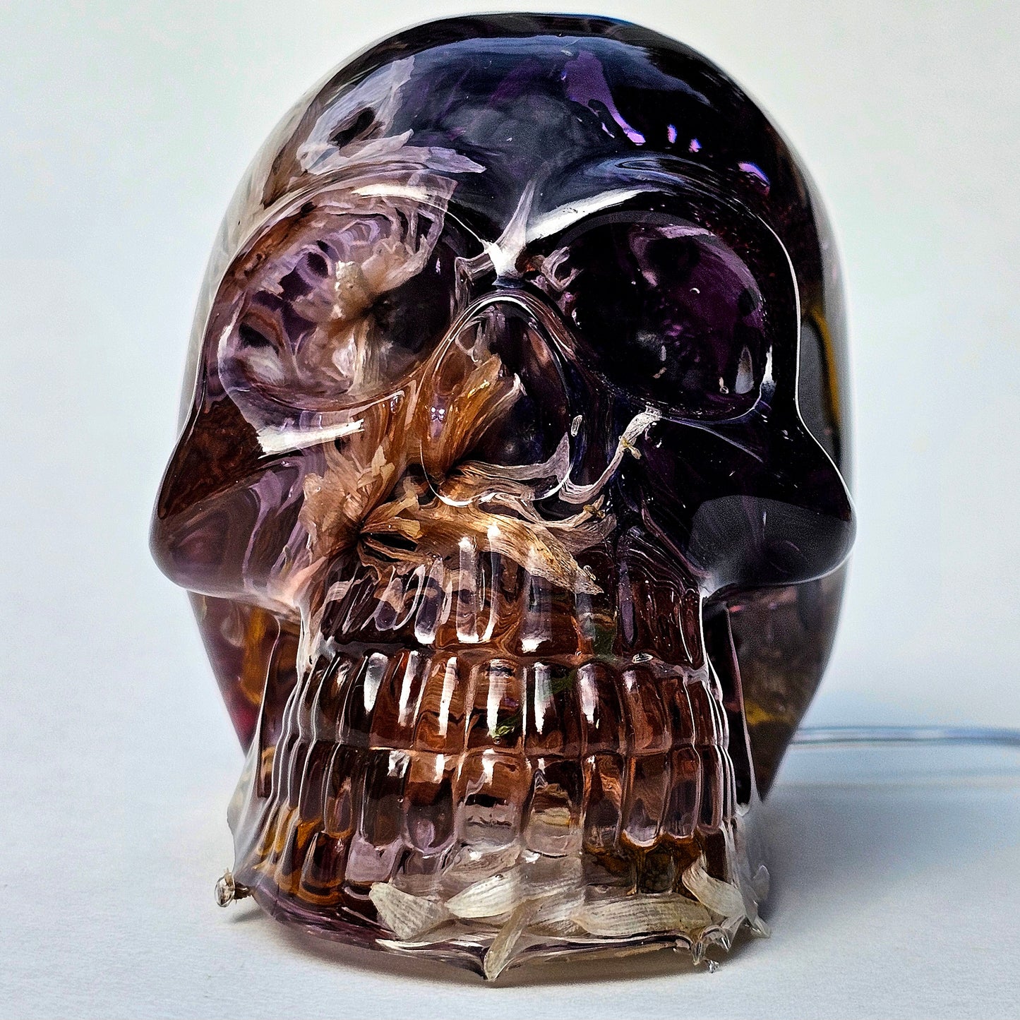 #0293- Handmade Resin Skull - Autumn flower blend in light purple resin. This one lights up! HAS LIGHTS!