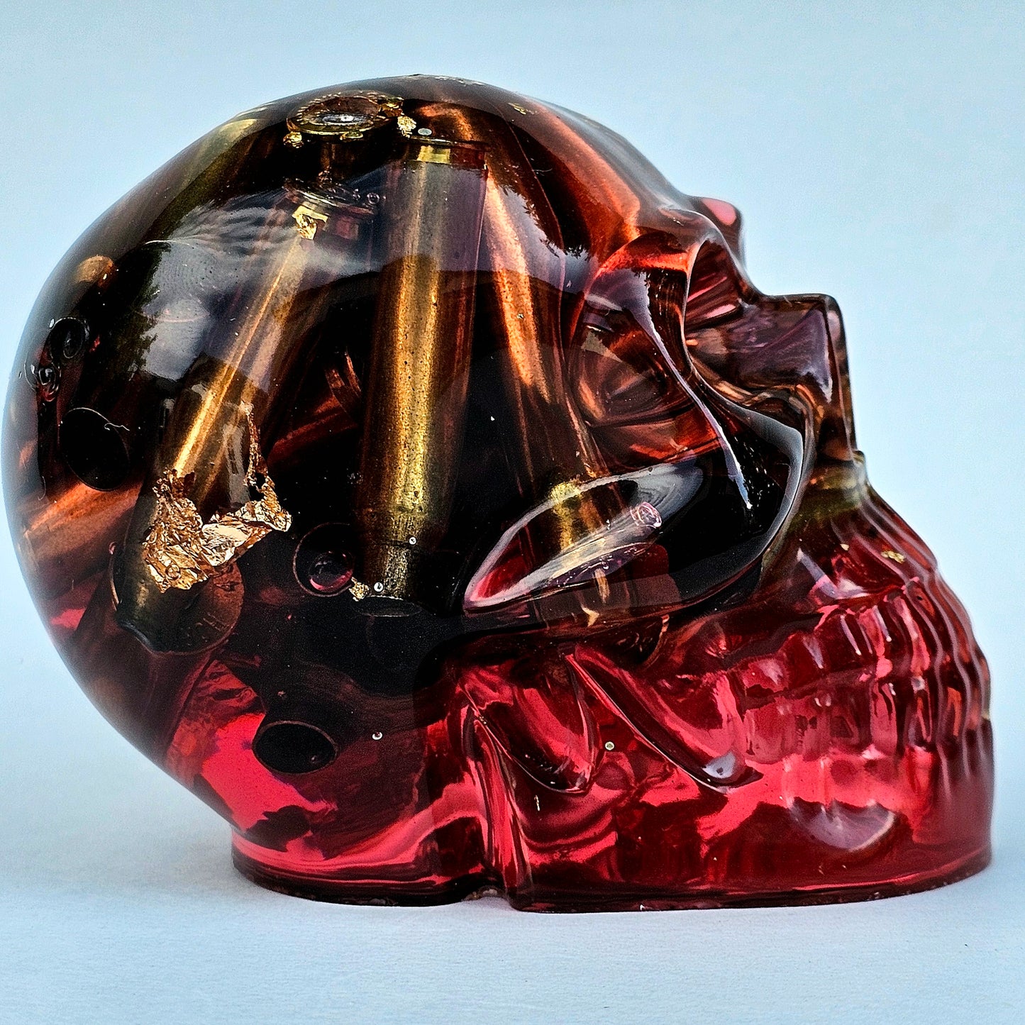 #0278 Handmade Resin Skull - Brass in red resin with gold accents