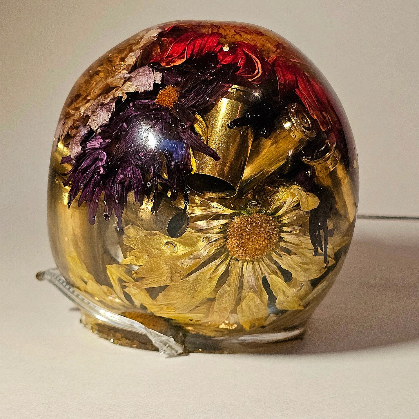 #0270 Handmade Resin Skull - Mixed flowers in clear resin. HAS LIGHTS. Battery operated.
