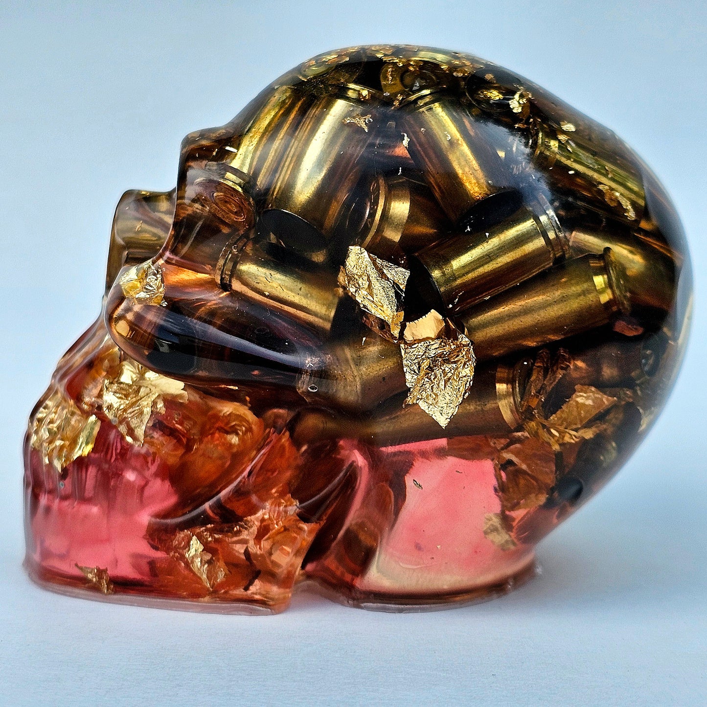 SOLD #0277 Handmade Resin Skull - Brass in red resin with gold accents