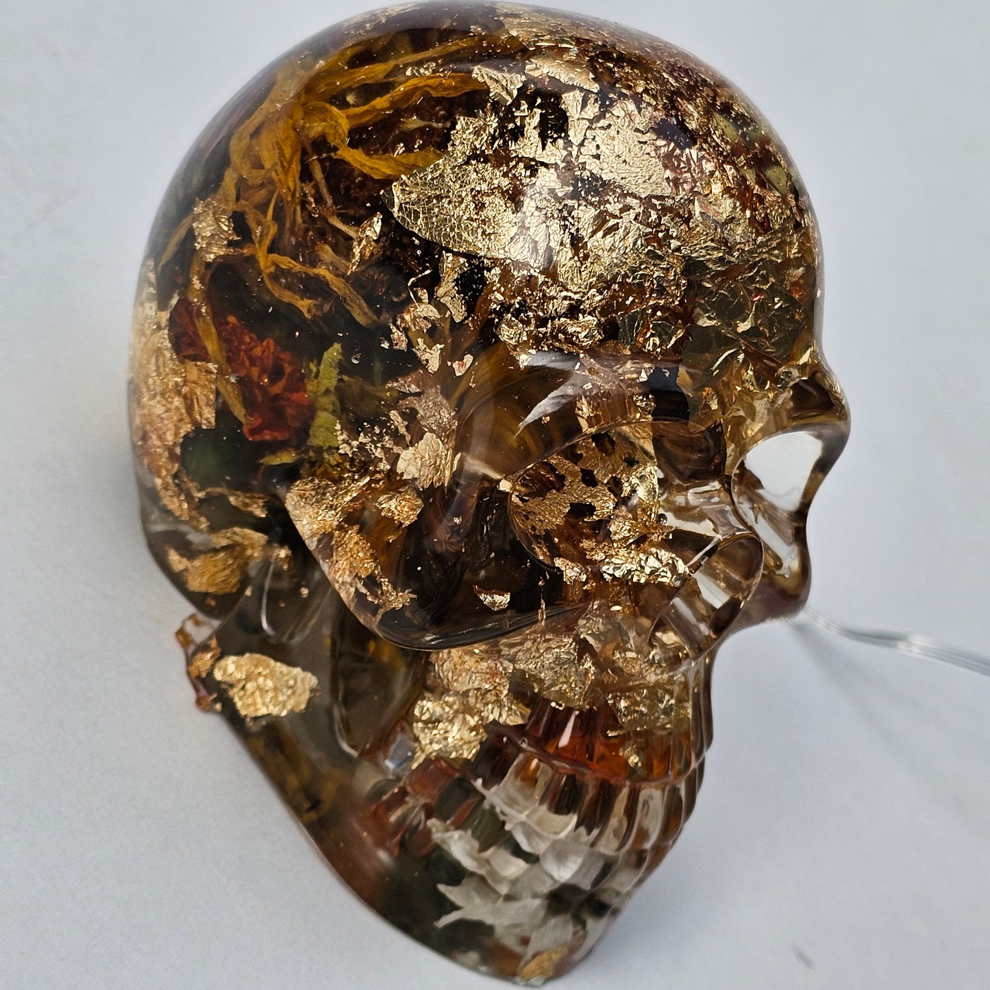 #0295 - Handmade Resin Skull - Autumn flower blend with gold foil. This one lights up! HAS LIGHTS!